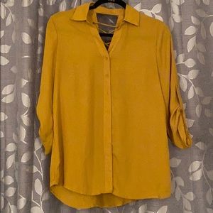 Yellow button down shirt